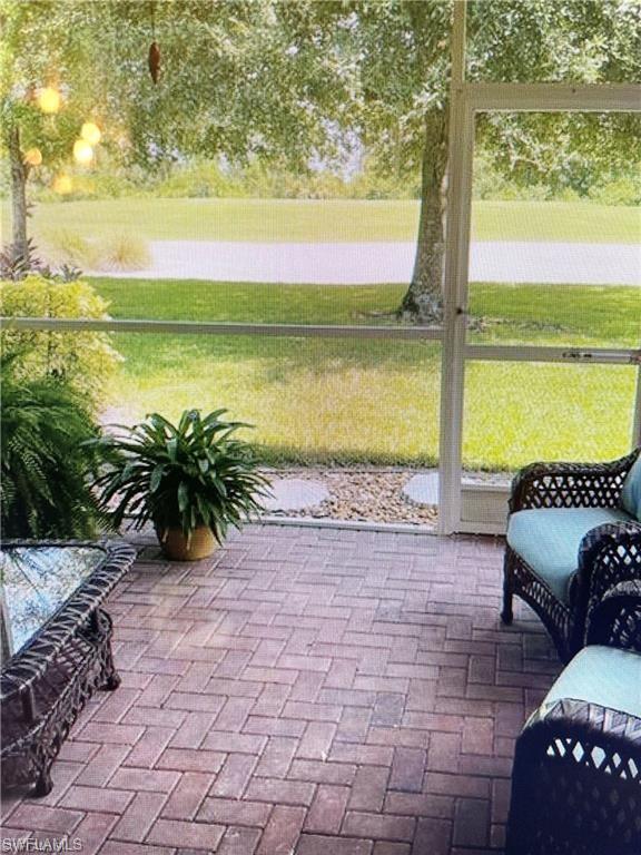 2132 Par Drive Naples, FL 34120 - Photo 11 of 15 a view of a terrace with lake view and a ocean view