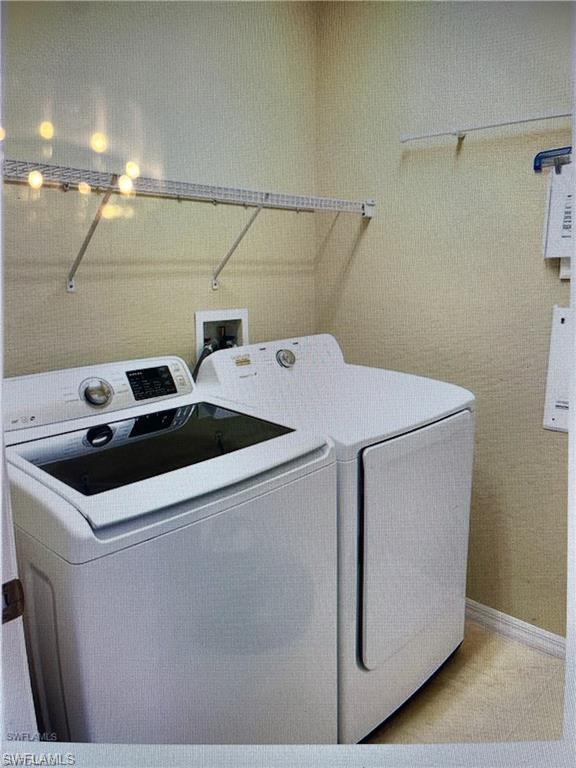 2132 Par Drive Naples, FL 34120 - Photo 15 of 15 a utility room with dryer and washer
