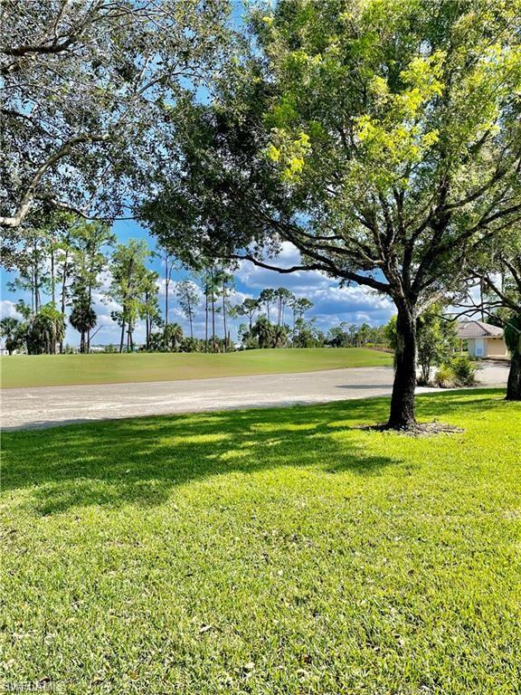 2132 Par Drive Naples, FL 34120 - Photo 16 of 17 View of green lawn