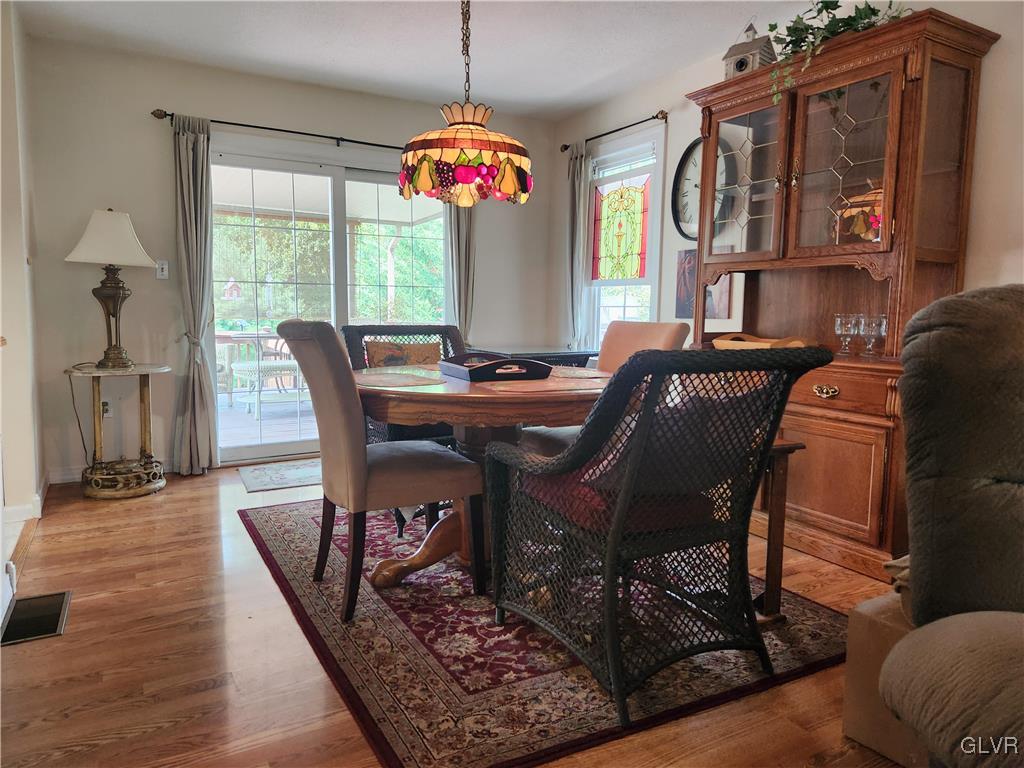 3055 Athena Drive Bethlehem, PA 18017 - Photo 4 of 6 a view of a dining room with furniture window and outside view