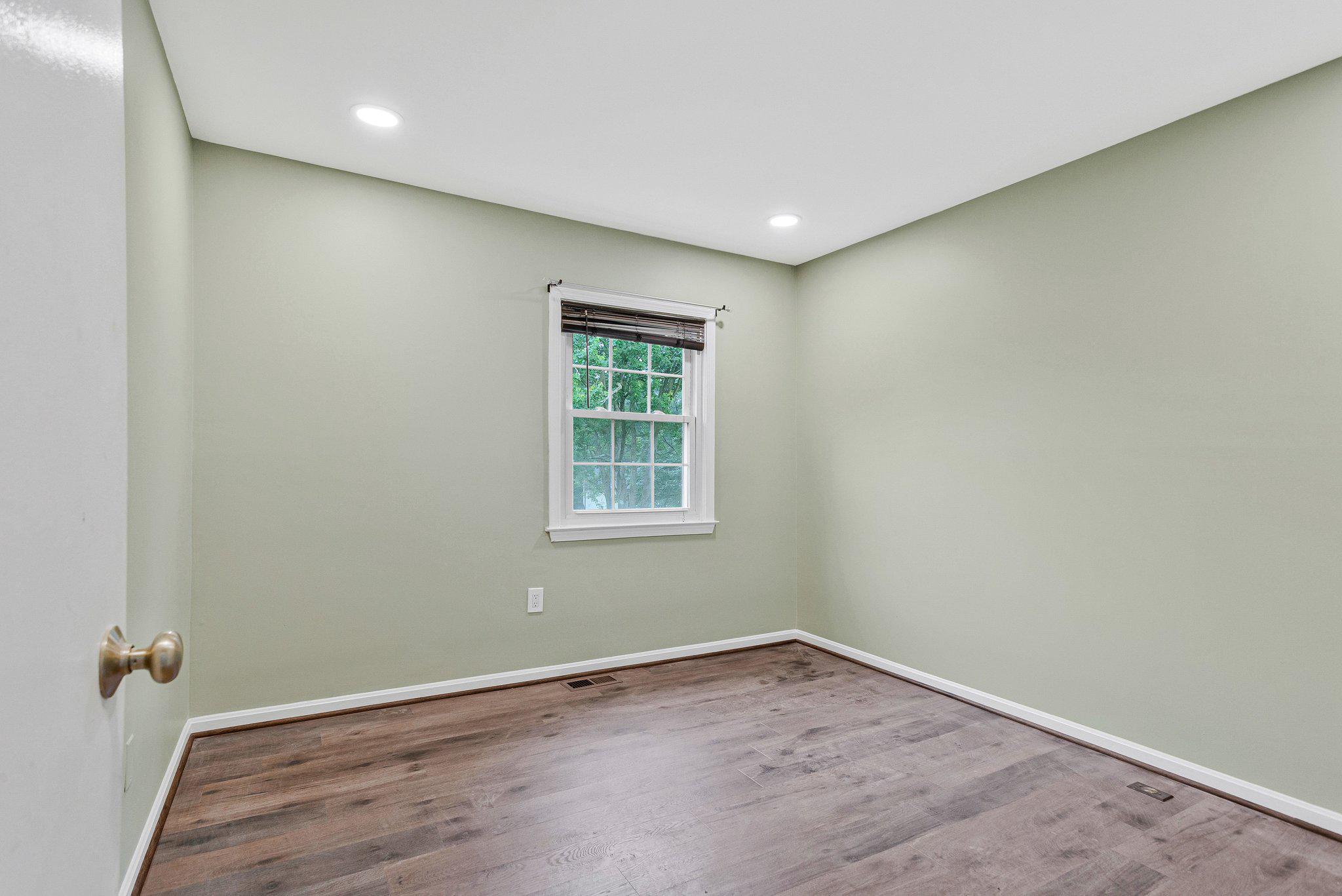 1675 Ridgely Court, Unit 182 Crofton, MD 21114 - Photo 37 of 47 an empty room with a hardwood