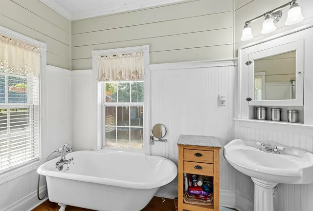 a bathroom with a sink and a bathtub