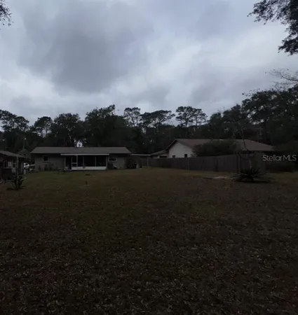 a view of outdoor space and yard