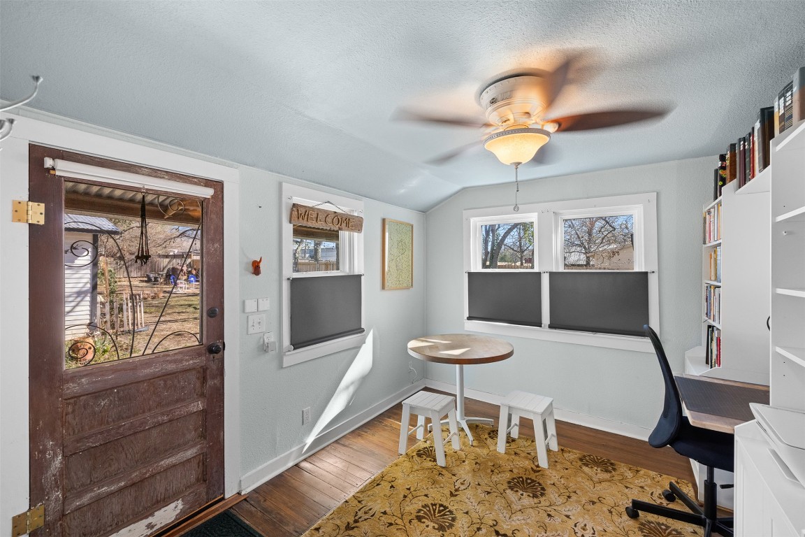 660 North Main Street La Grange, TX 78945 - Photo 11 of 24 Office featuring vaulted ceiling, wood finished floors, a textured ceiling, and a ceiling fan