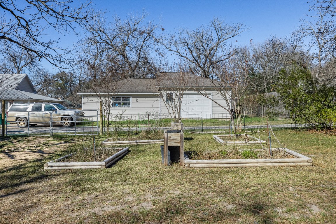 660 North Main Street La Grange, TX 78945 - Photo 18 of 24 View of yard featuring a garden