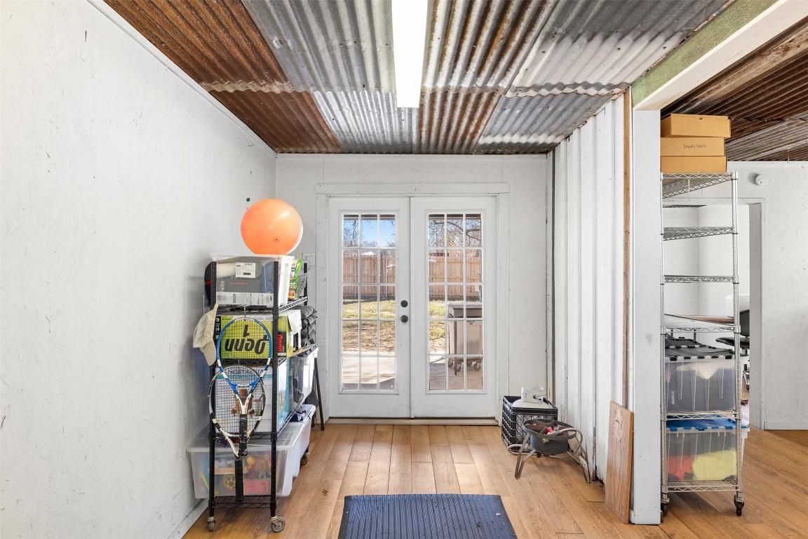 660 North Main Street La Grange, TX 78945 - Photo 22 of 24 Doorway to outside with hardwood / wood-style floors and french doors