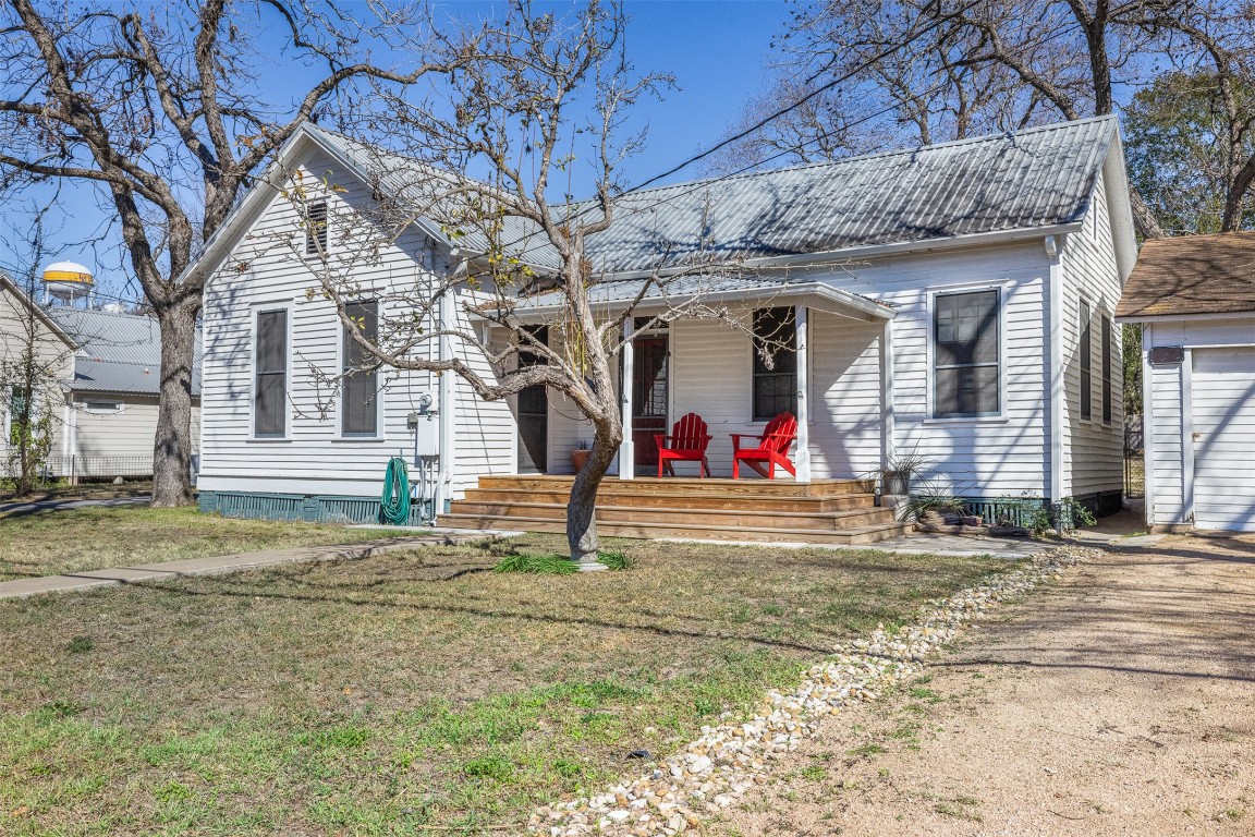 660 North Main Street La Grange, TX 78945 - Photo 3 of 24 View of front of home featuring a front lawn