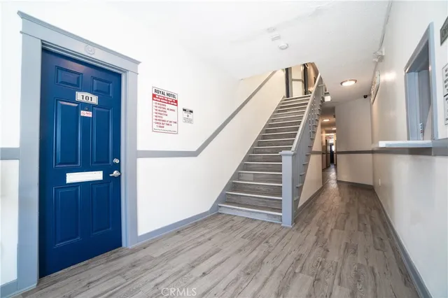 a view of entryway with wooden floor