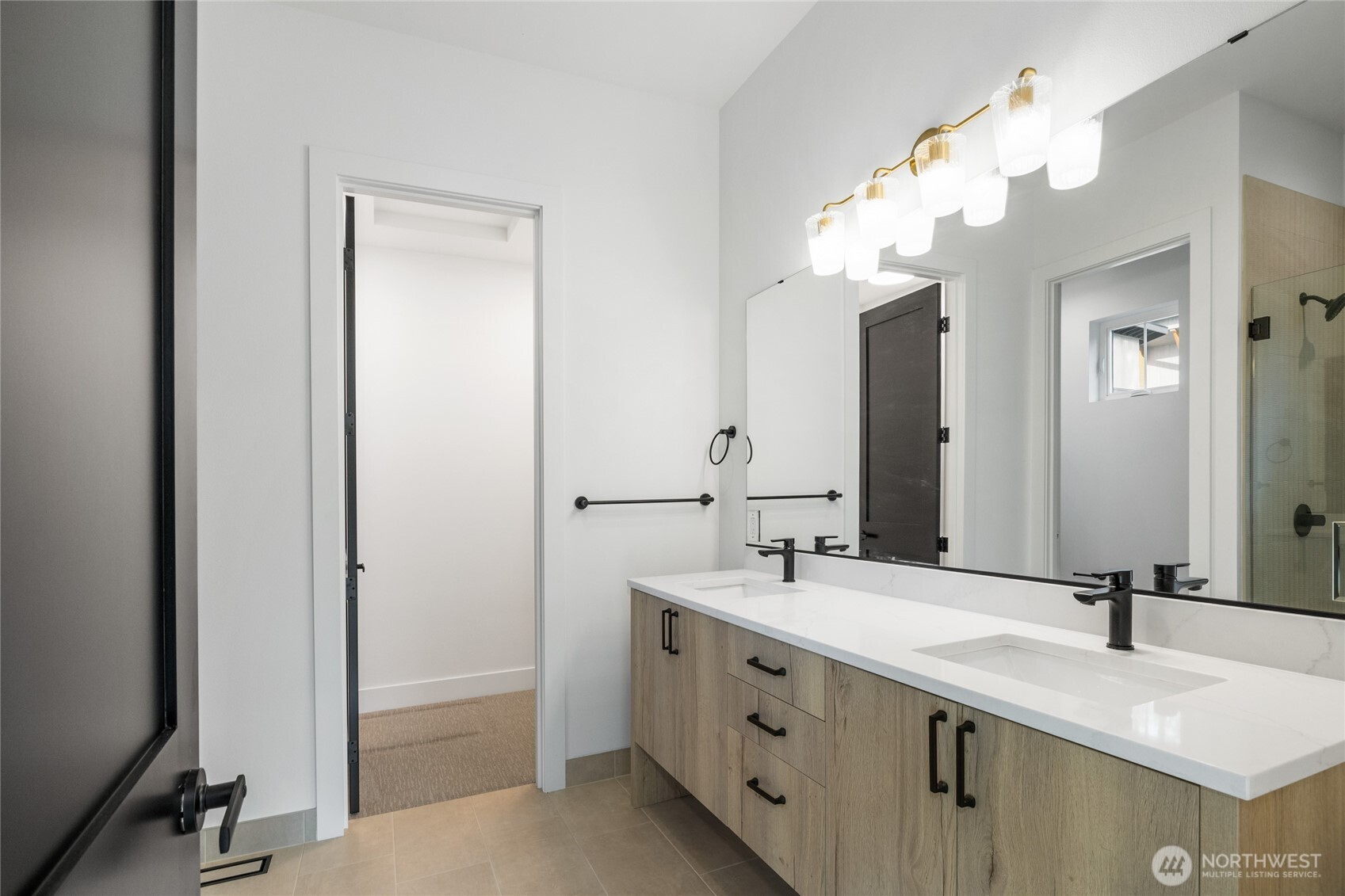 1680 Wanawish Loop Cle Elum, WA 98922 - Photo 11 of 28 a bathroom with a double vanity sink and a mirror