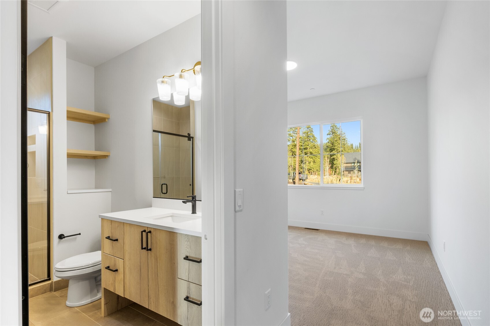 1680 Wanawish Loop Cle Elum, WA 98922 - Photo 15 of 28 a bathroom with a toilet sink and mirror