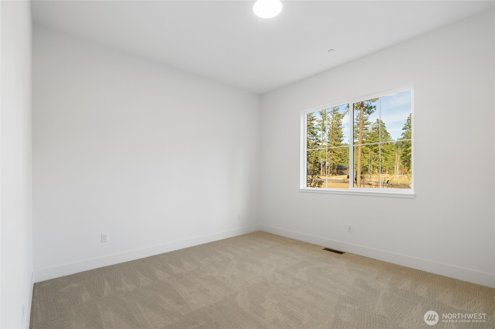1680 Wanawish Loop Cle Elum, WA 98922 - Photo 17 of 28 an empty room with windows