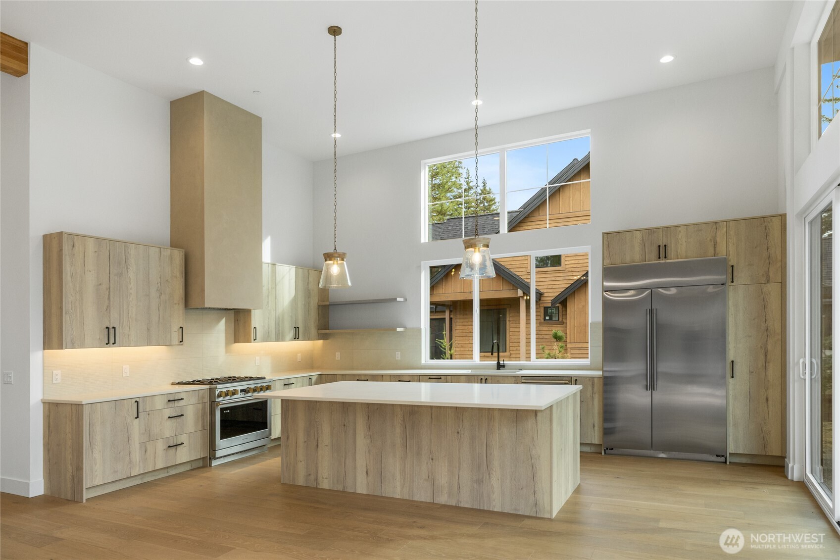 1680 Wanawish Loop Cle Elum, WA 98922 - Photo 2 of 28 a kitchen with stainless steel appliances a stove a refrigerator and a sink