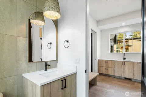 a bathroom with a sink and a mirror