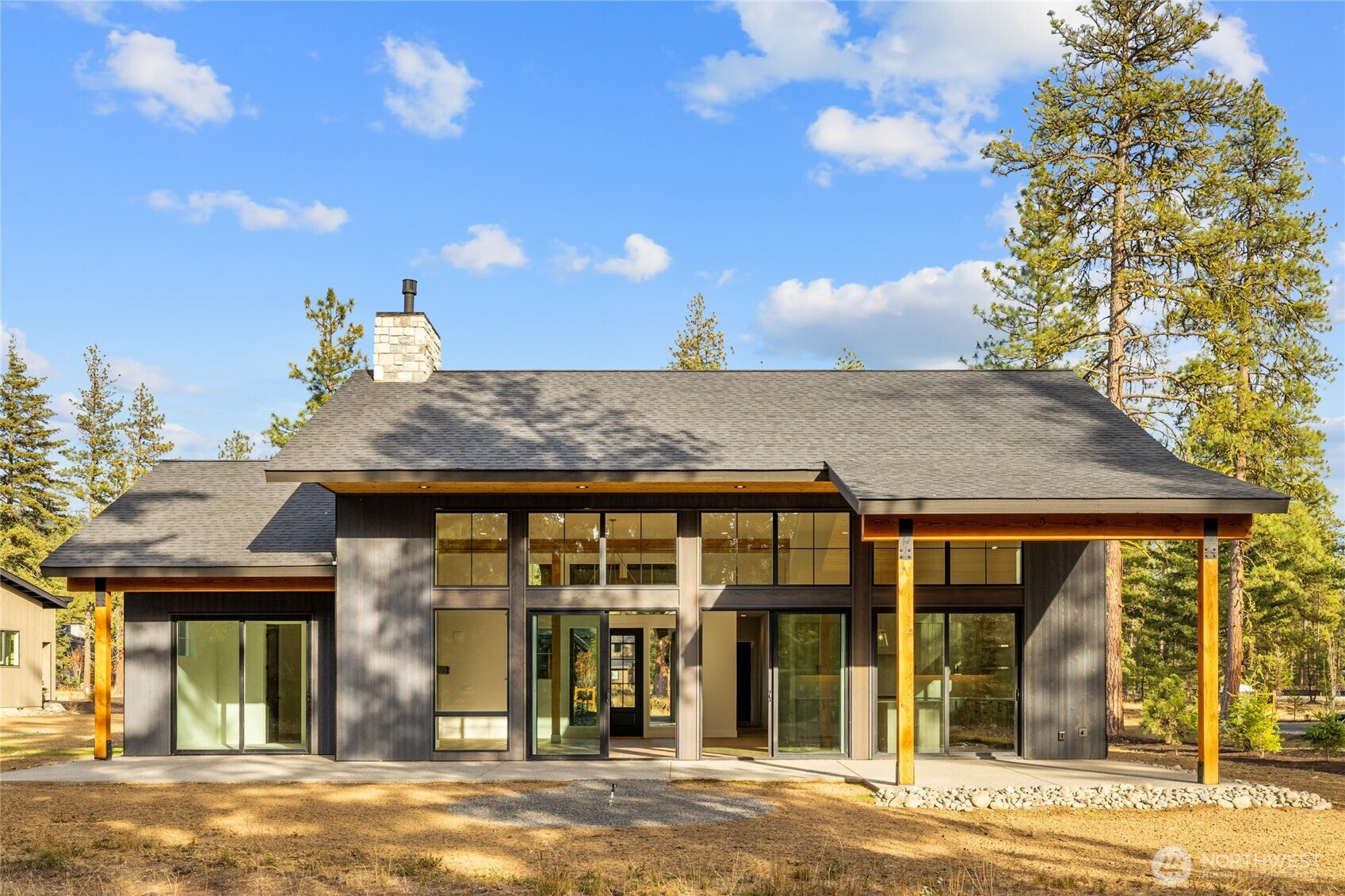 1680 Wanawish Loop Cle Elum, WA 98922 - Photo 24 of 28 a view of a house with a terrace and a tree