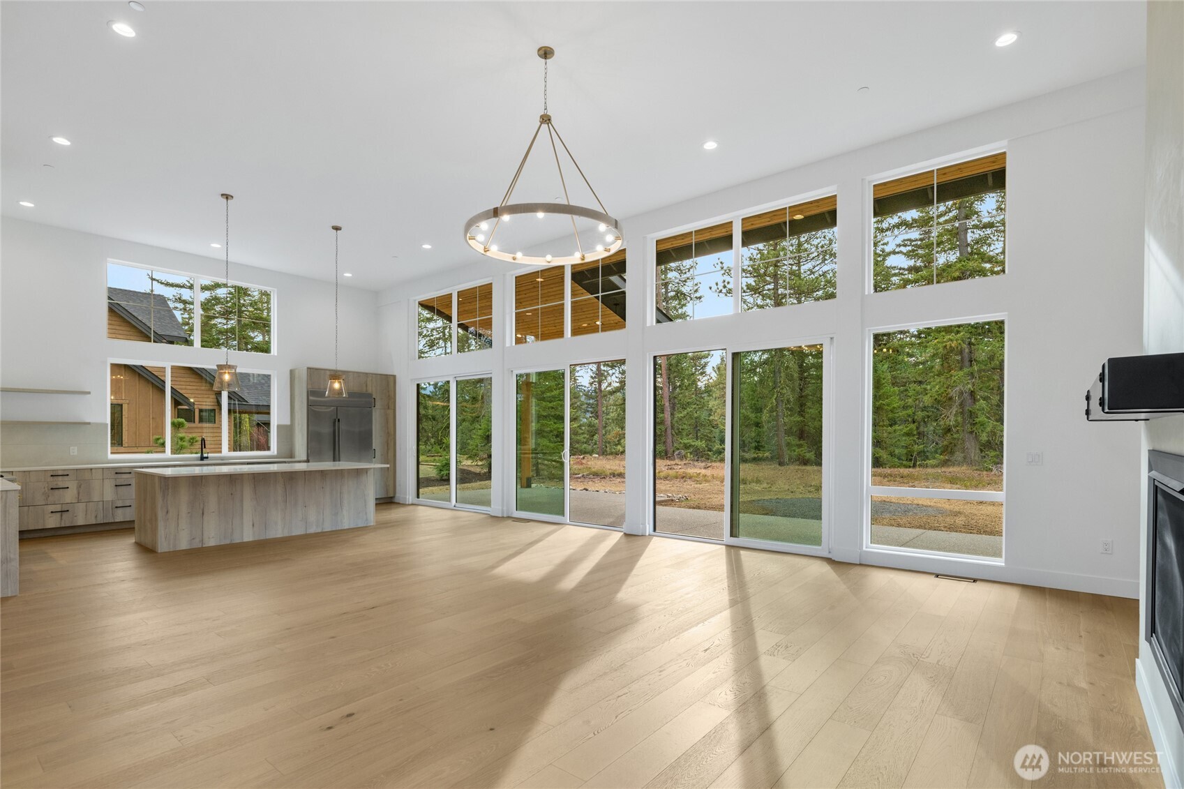 1680 Wanawish Loop Cle Elum, WA 98922 - Photo 4 of 28 a view of an empty room with a window and wooden floor