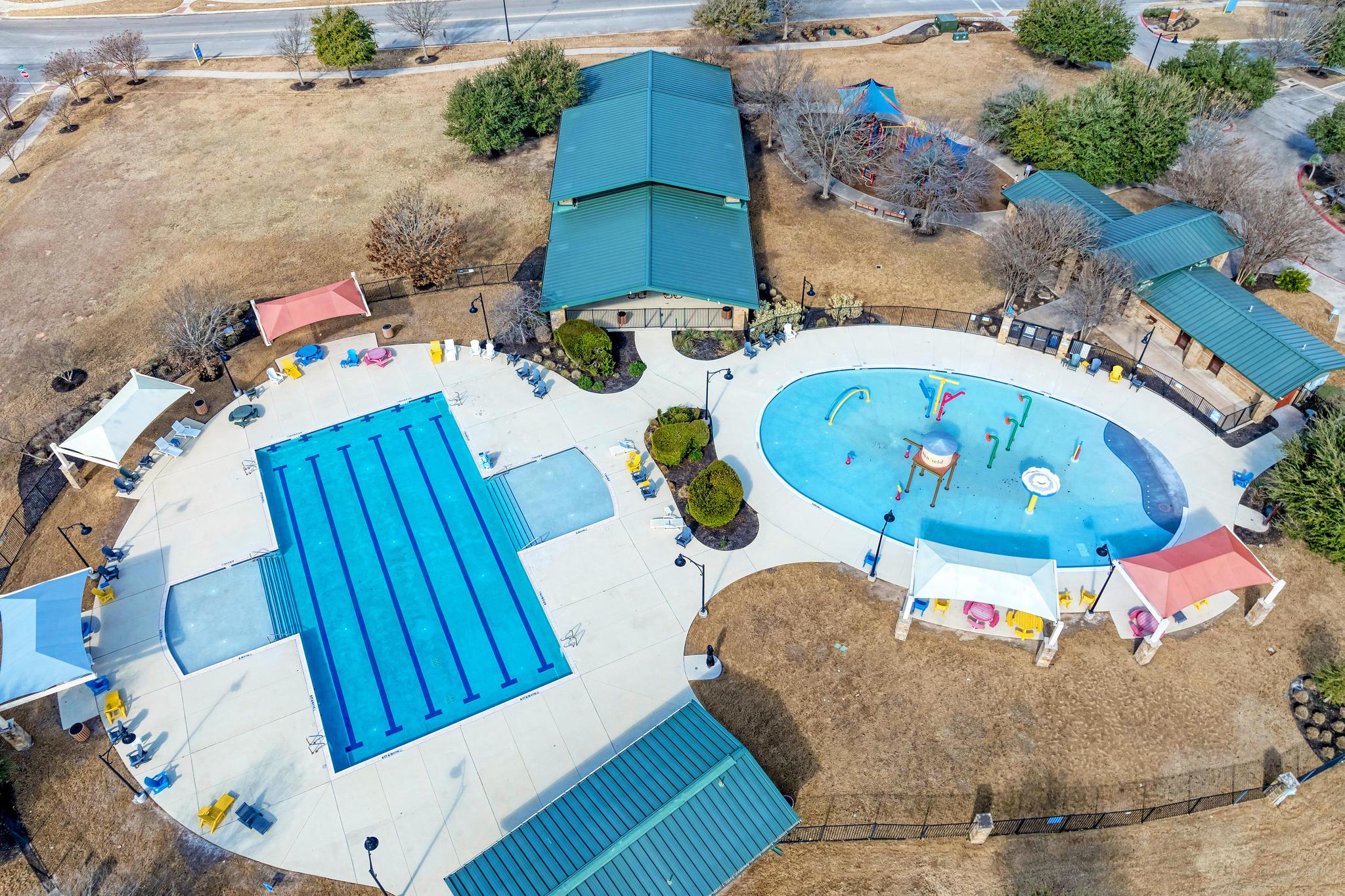 198 Rough Leaf Drive Buda, TX 78610 - Photo 33 of 38 Bird's eye view of a pool