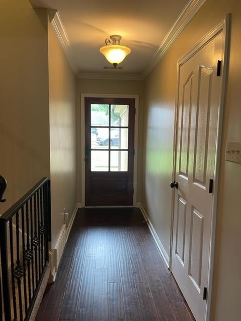 238 Wolf Ridge Cove Collierville, TN 38017 - Photo 2 of 25 a view of an empty room with wooden floor and a window