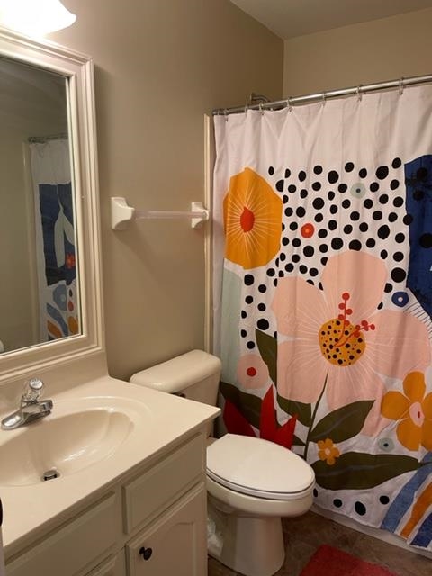238 Wolf Ridge Cove Collierville, TN 38017 - Photo 21 of 25 a bathroom with a sink toilet and shower