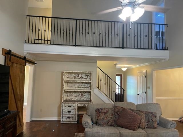238 Wolf Ridge Cove Collierville, TN 38017 - Photo 6 of 25 a living room with furniture a lamp and a window