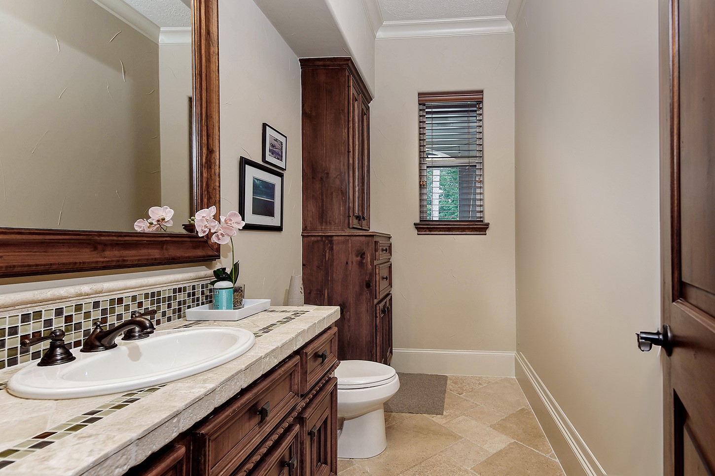 119 Angel Leaf Road The Woodlands, TX 77380 - Photo 19 of 50 a bathroom with a sink a toilet and mirror