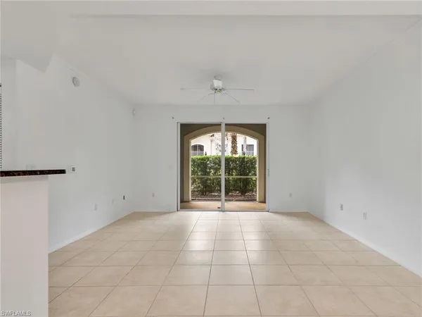 a view of a room with a large window