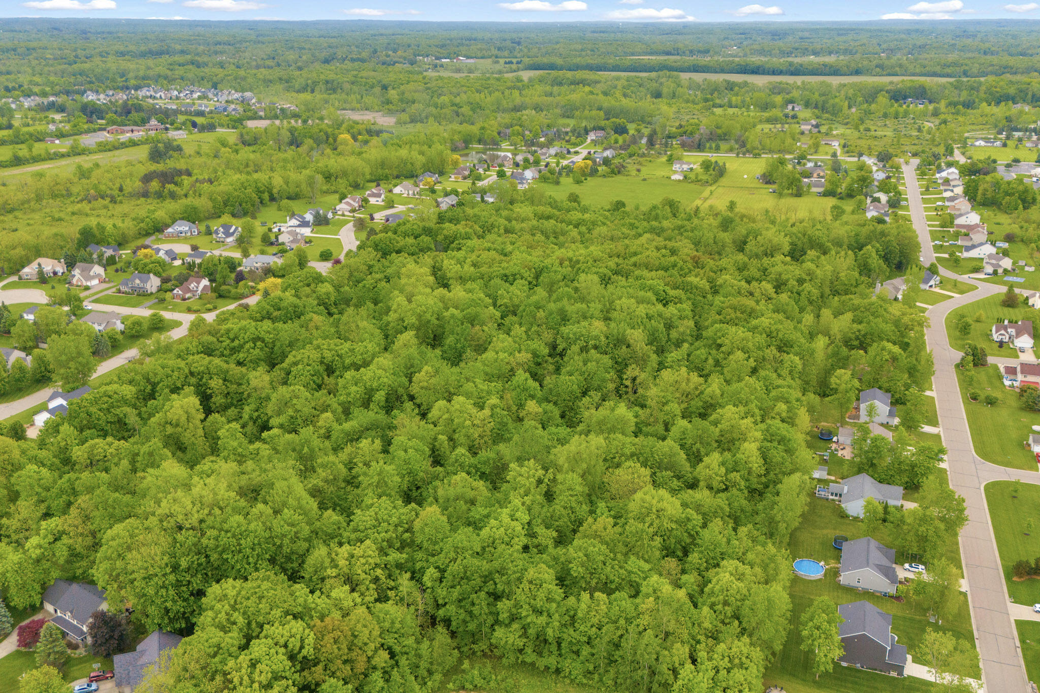 2045 East Baldwin Road Grand Blanc, MI 48439 - Photo 9 of 14 28-27-DJI_20250528111656_0160_D