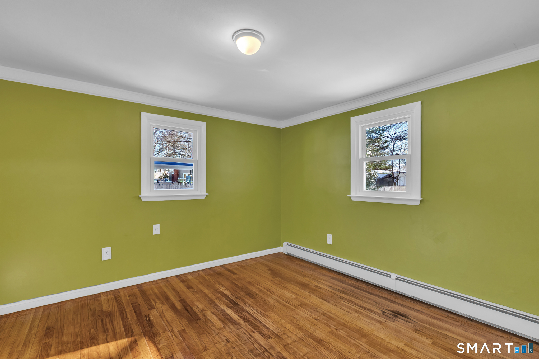 9 Carney Road Enfield, CT 06082 - Photo 21 of 40 a view of a room with wooden floor and window