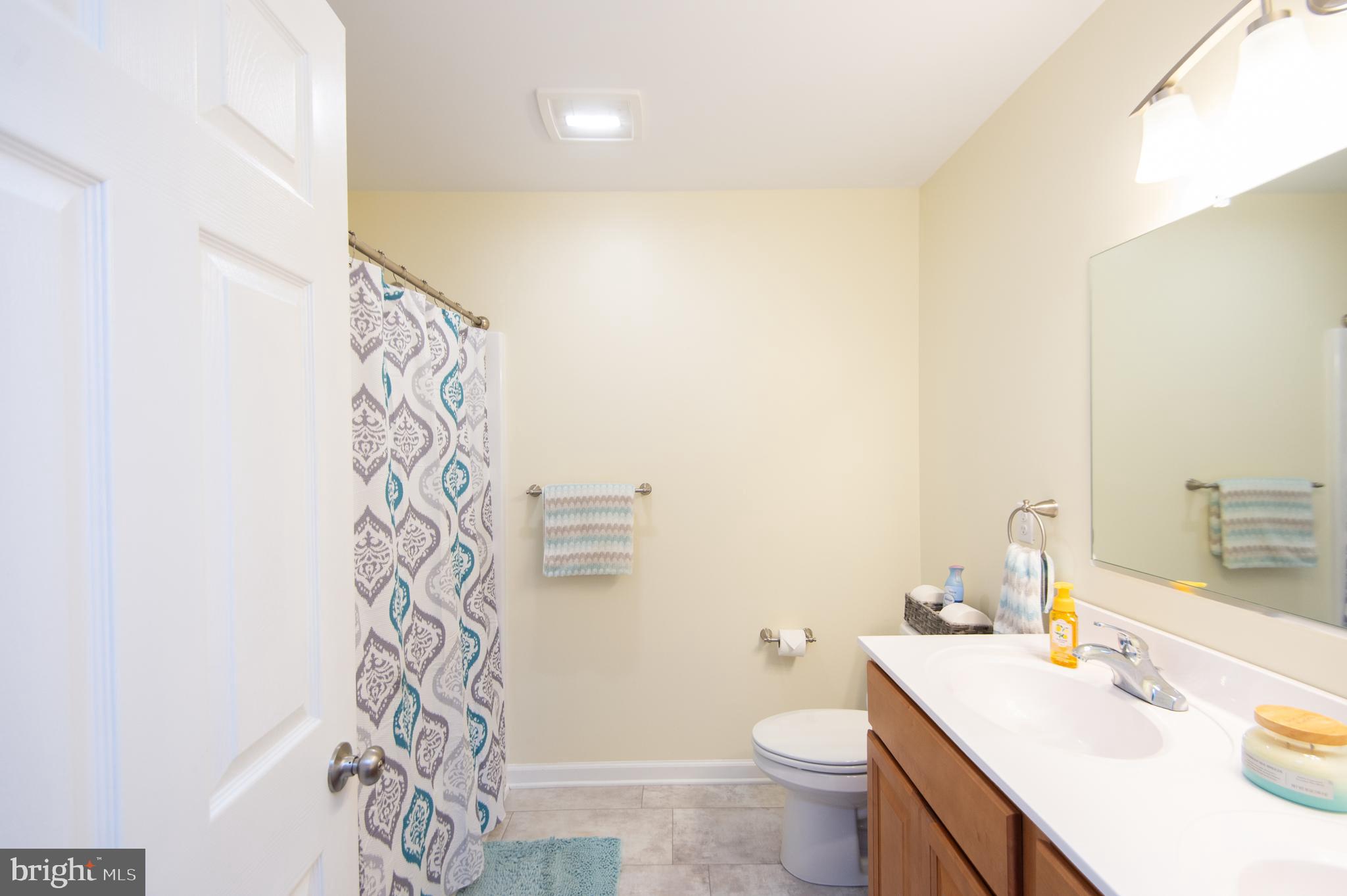 2 Arbutus Terrace Cambridge, MD 21613 - Photo 25 of 41 a bathroom with a sink toilet and shower