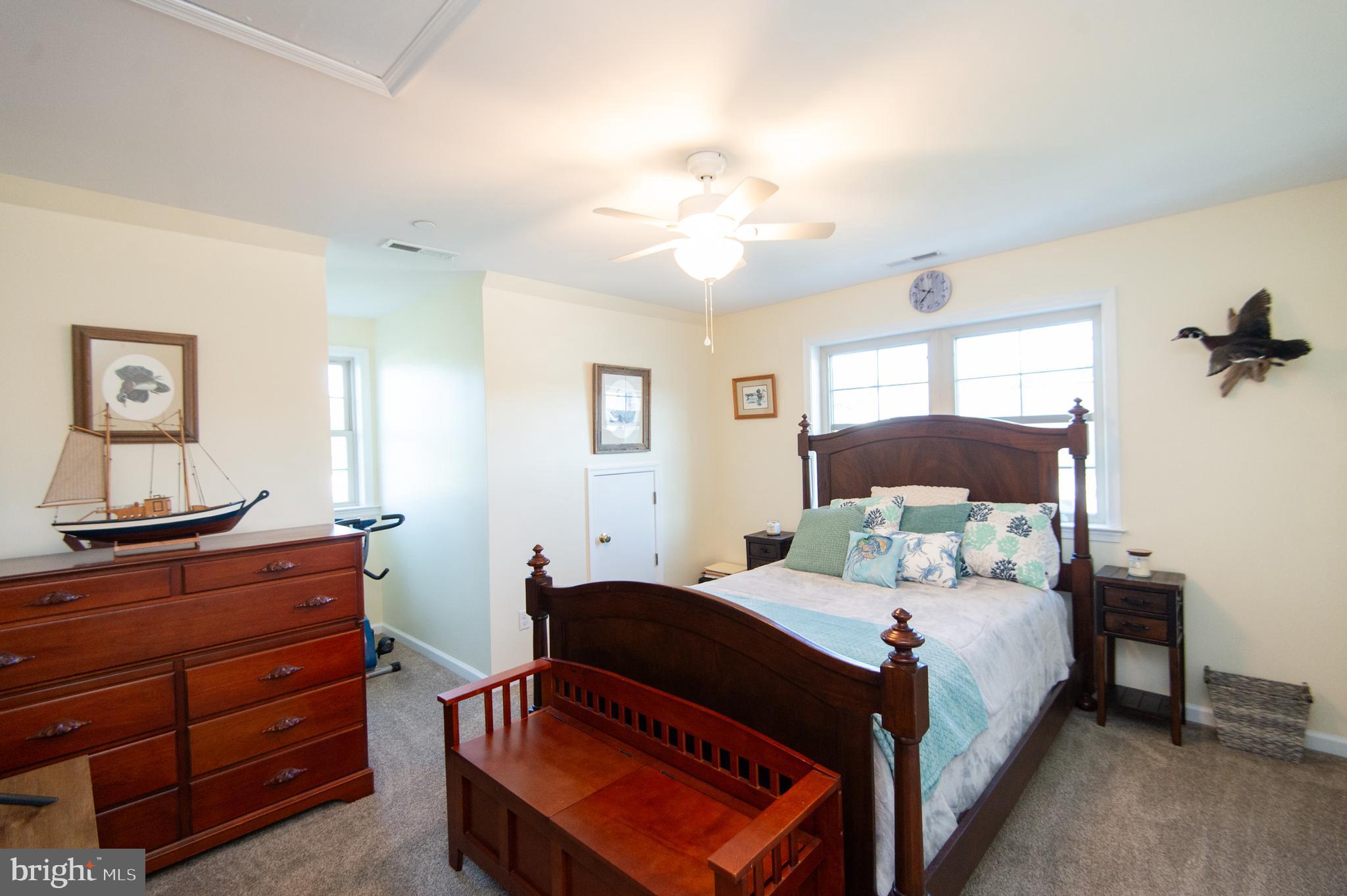 2 Arbutus Terrace Cambridge, MD 21613 - Photo 26 of 41 a bedroom with a bed and window