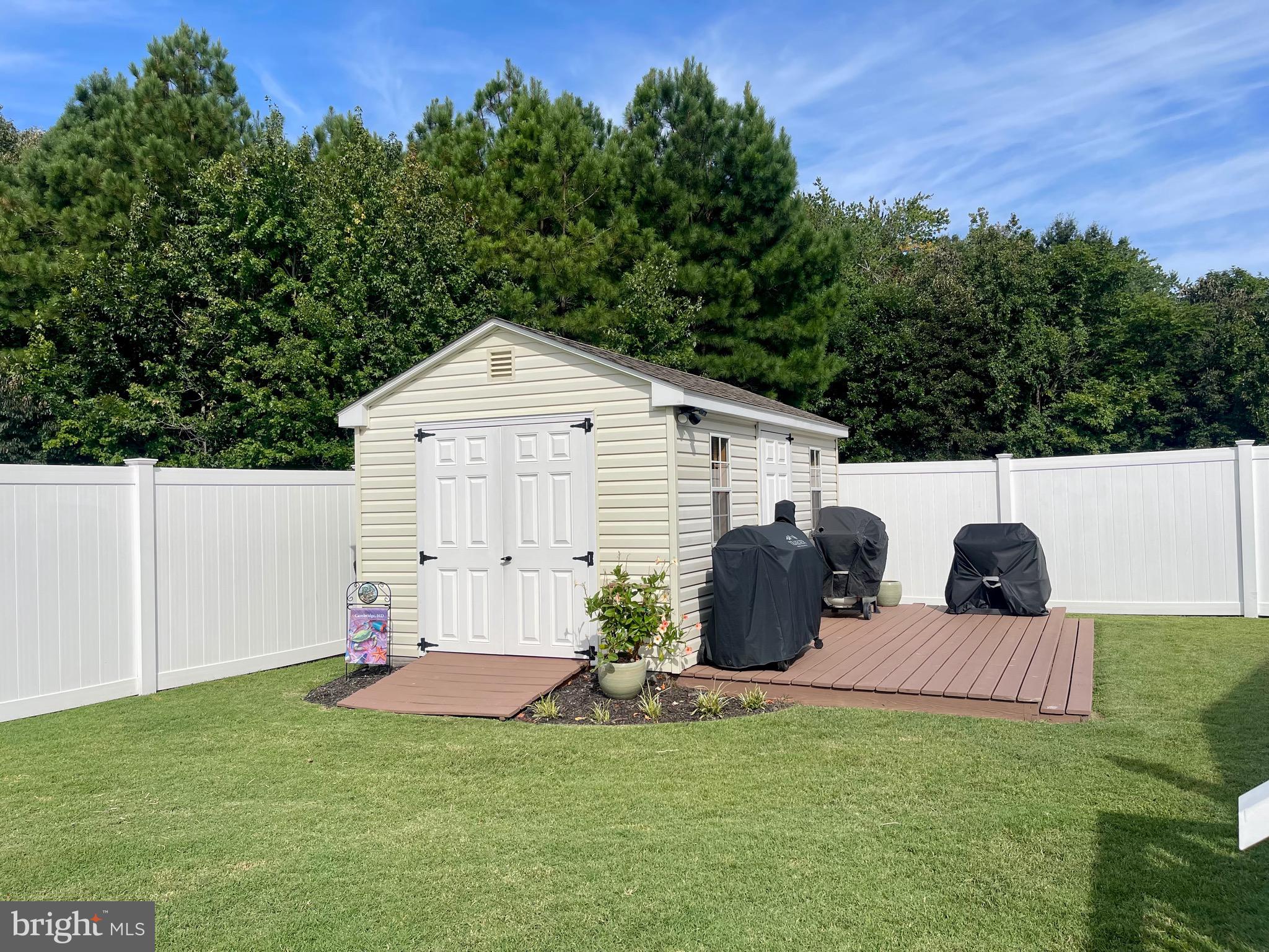 2 Arbutus Terrace Cambridge, MD 21613 - Photo 39 of 41 a view of backyard with seating area and green space