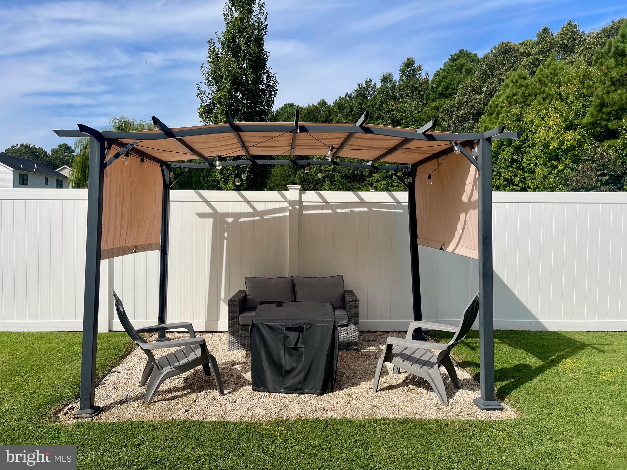 2 Arbutus Terrace Cambridge, MD 21613 - Photo 40 of 41 a view of two chairs and table in patio