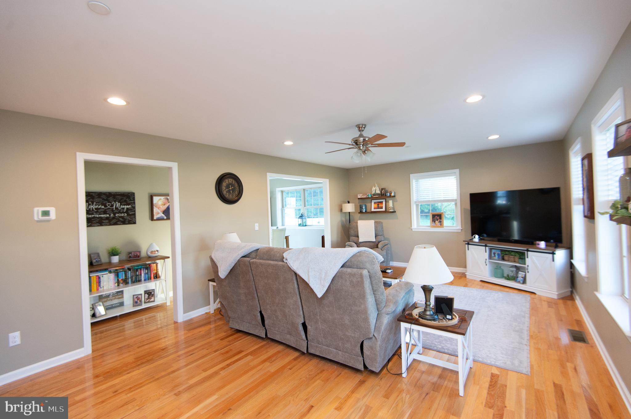 2 Arbutus Terrace Cambridge, MD 21613 - Photo 4 of 41 a living room with furniture and a flat screen tv