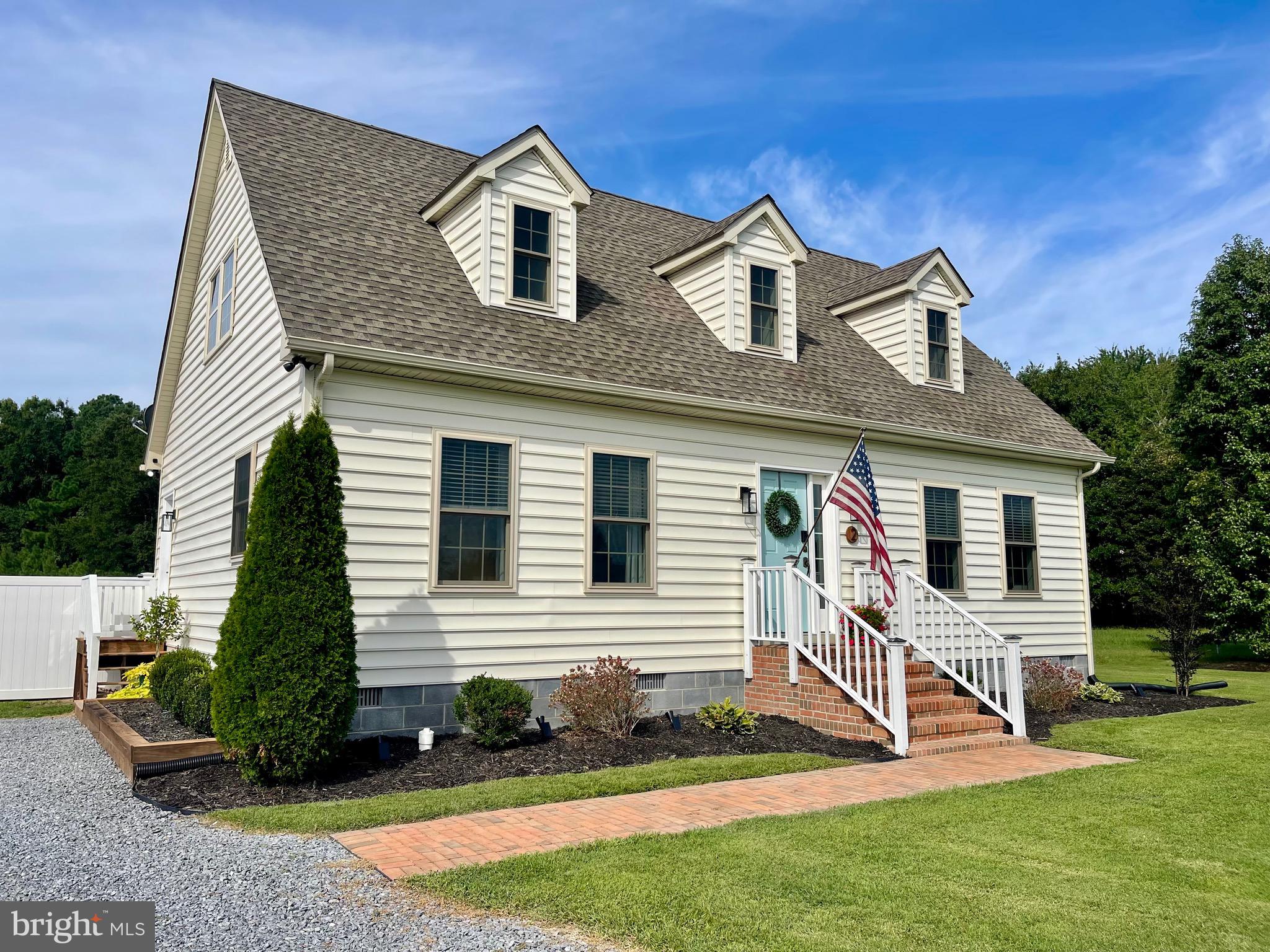 2 Arbutus Terrace Cambridge, MD 21613 - Photo 41 of 41 a front view of a house with a yard