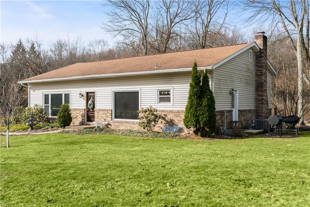 237 North Woodlawn Road Butler, PA 16001 - Photo 2 of 37 a view of a house with backyard and sitting area