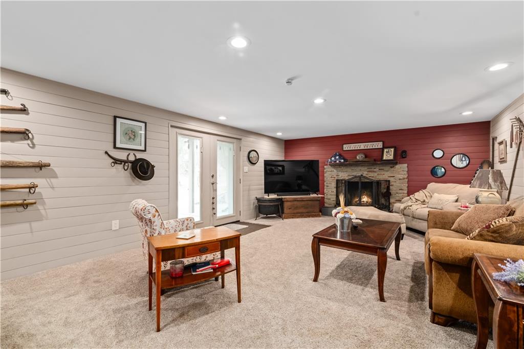 237 North Woodlawn Road Butler, PA 16001 - Photo 22 of 37 a living room with furniture and a fireplace