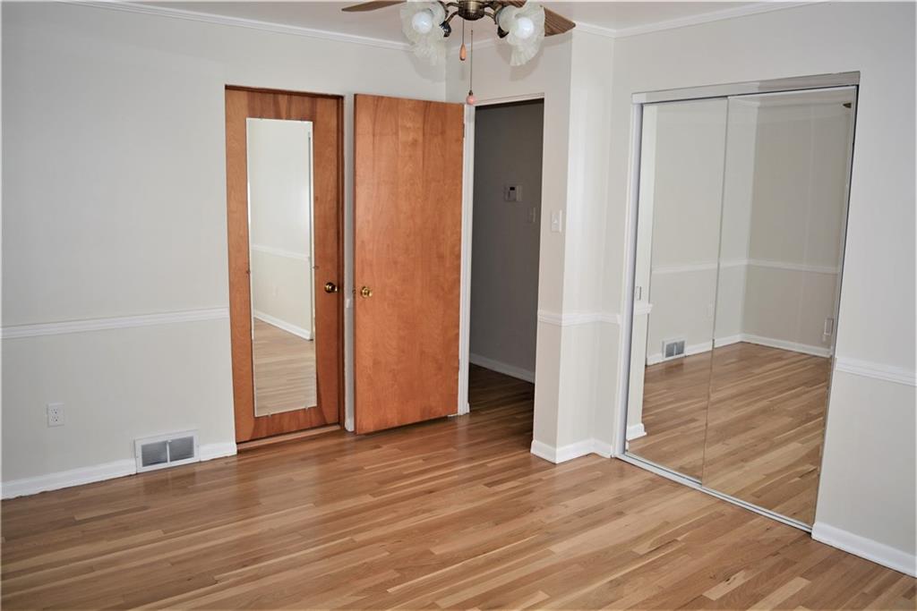 313 Woodcroft Road Economy, PA 15005 - Photo 13 of 23 bedroom 1 with mirrored closet and door to full bath