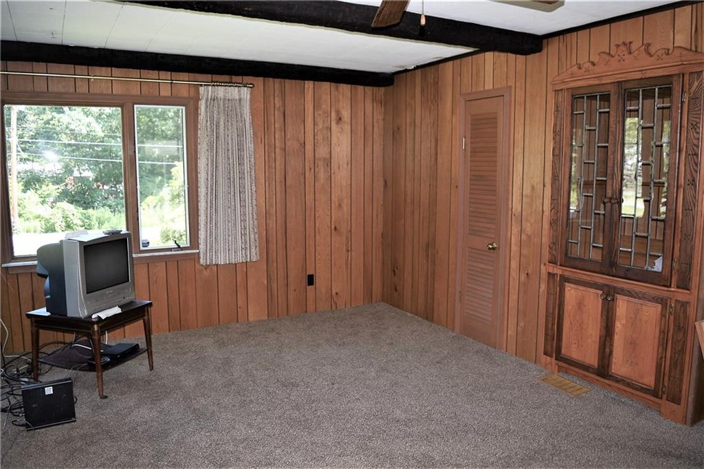 313 Woodcroft Road Economy, PA 15005 - Photo 3 of 23 Den with cedar closet and built in. Window facing Brookside.