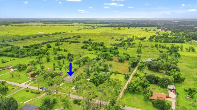 a view of an ocean and a yard