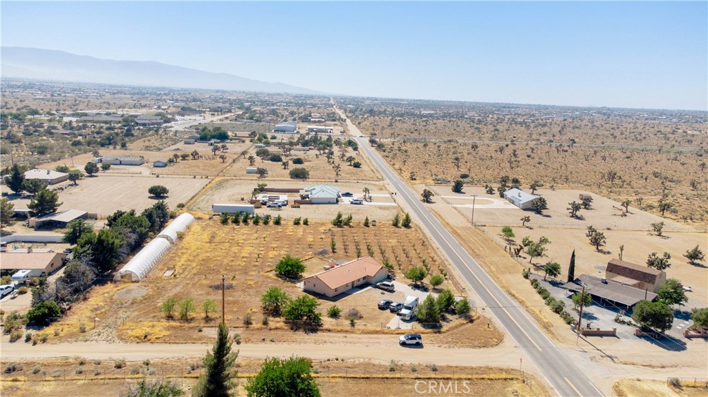 9995 Smoke Tree Road Hesperia, CA 92344 - Photo 42 of 74 an aerial view of residential houses with outdoor space