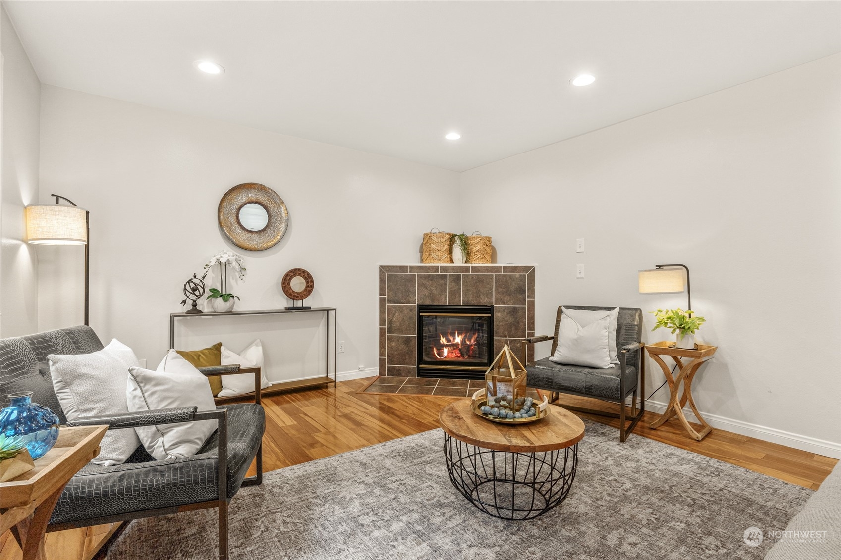 6712 Lower Ridge Road Everett, WA 98203 - Photo 18 of 34 a living room with furniture and a fireplace
