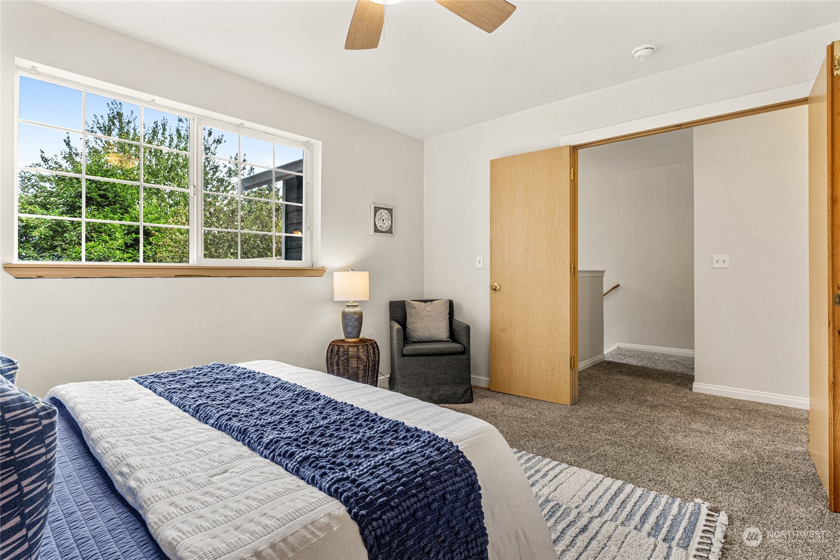 6712 Lower Ridge Road Everett, WA 98203 - Photo 23 of 34 a bedroom with a bed and a window
