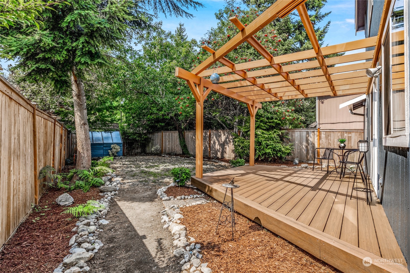 6712 Lower Ridge Road Everett, WA 98203 - Photo 30 of 34 a view of a backyard with sitting area