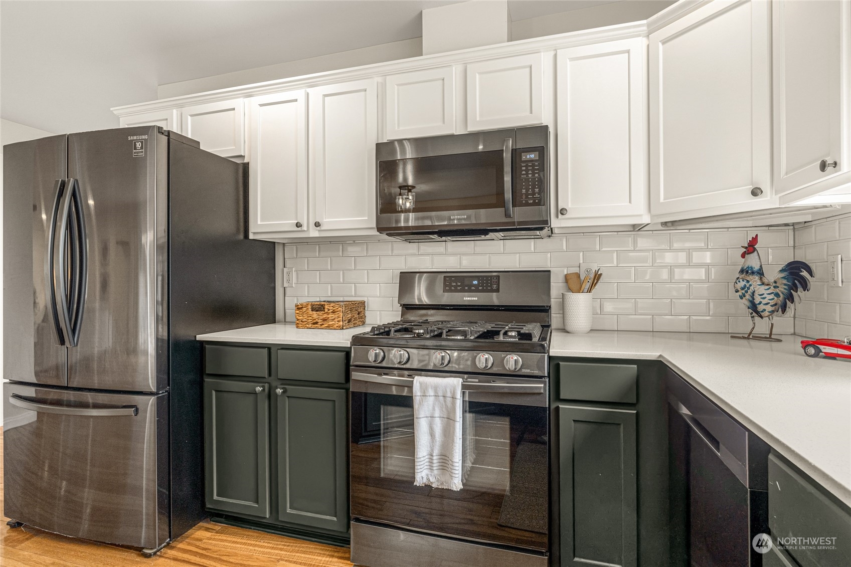 6712 Lower Ridge Road Everett, WA 98203 - Photo 10 of 34 a kitchen with a stove microwave and refrigerator