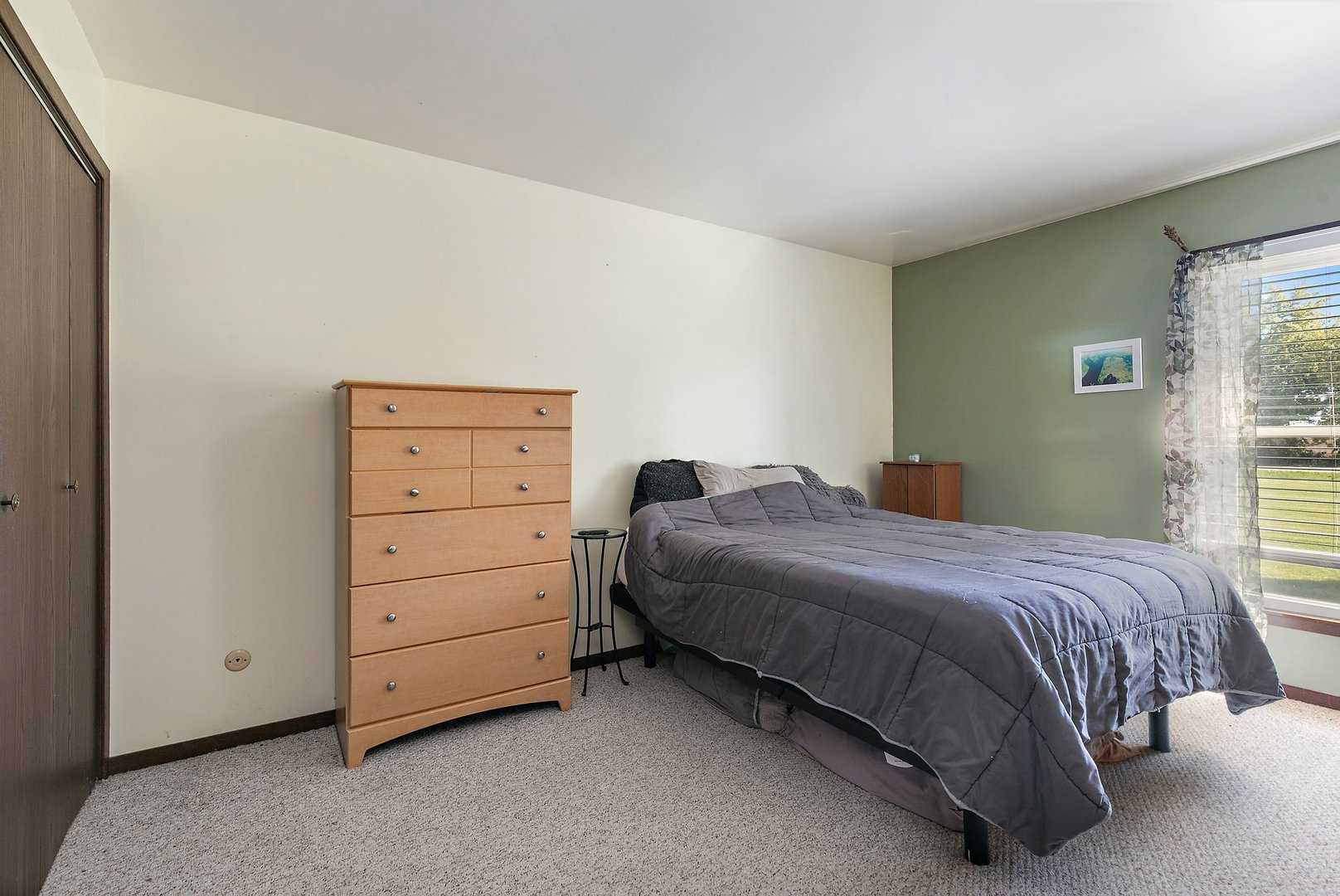 5815 Johnson Road Marengo, IL 60152 - Photo 11 of 30 a bedroom with a bed and a dresser