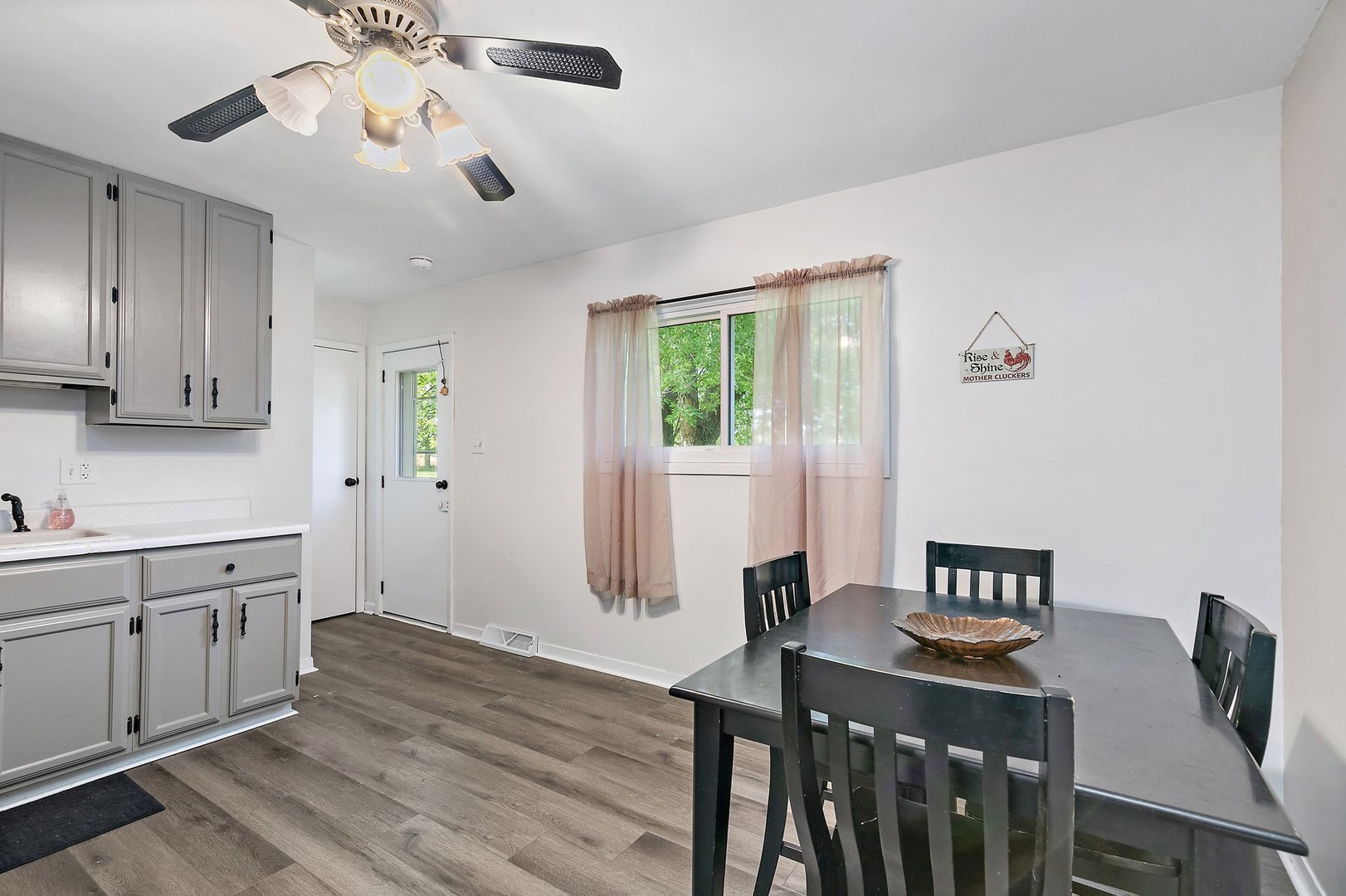5815 Johnson Road Marengo, IL 60152 - Photo 16 of 30 a view of a dining room with furniture and window