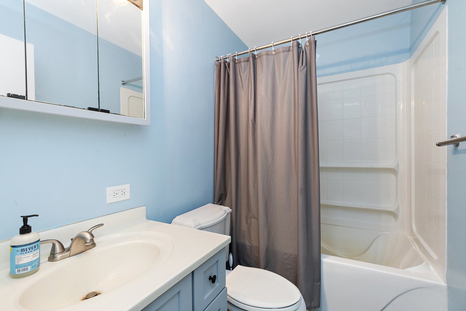 5815 Johnson Road Marengo, IL 60152 - Photo 18 of 30 a bathroom with a sink a toilet and shower curtain