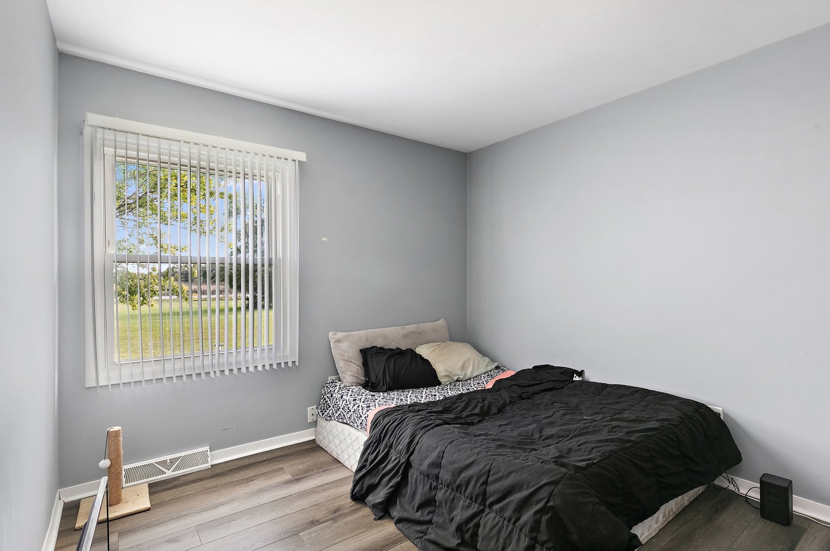 5815 Johnson Road Marengo, IL 60152 - Photo 19 of 30 a bedroom with a bed and window