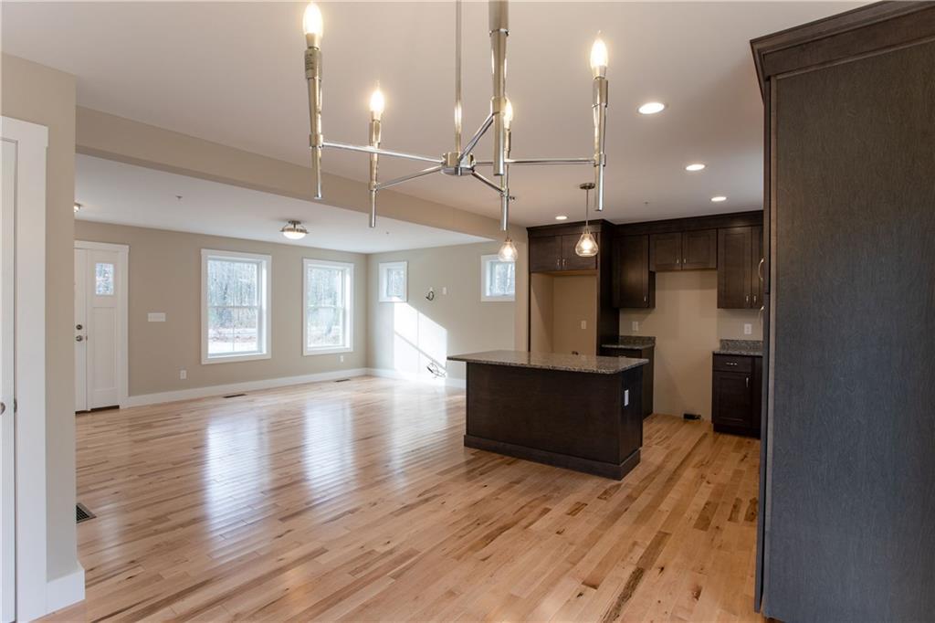 320 Wire Road Wells, ME 04090 - Photo 10 of 35 The dining room chandelier is...