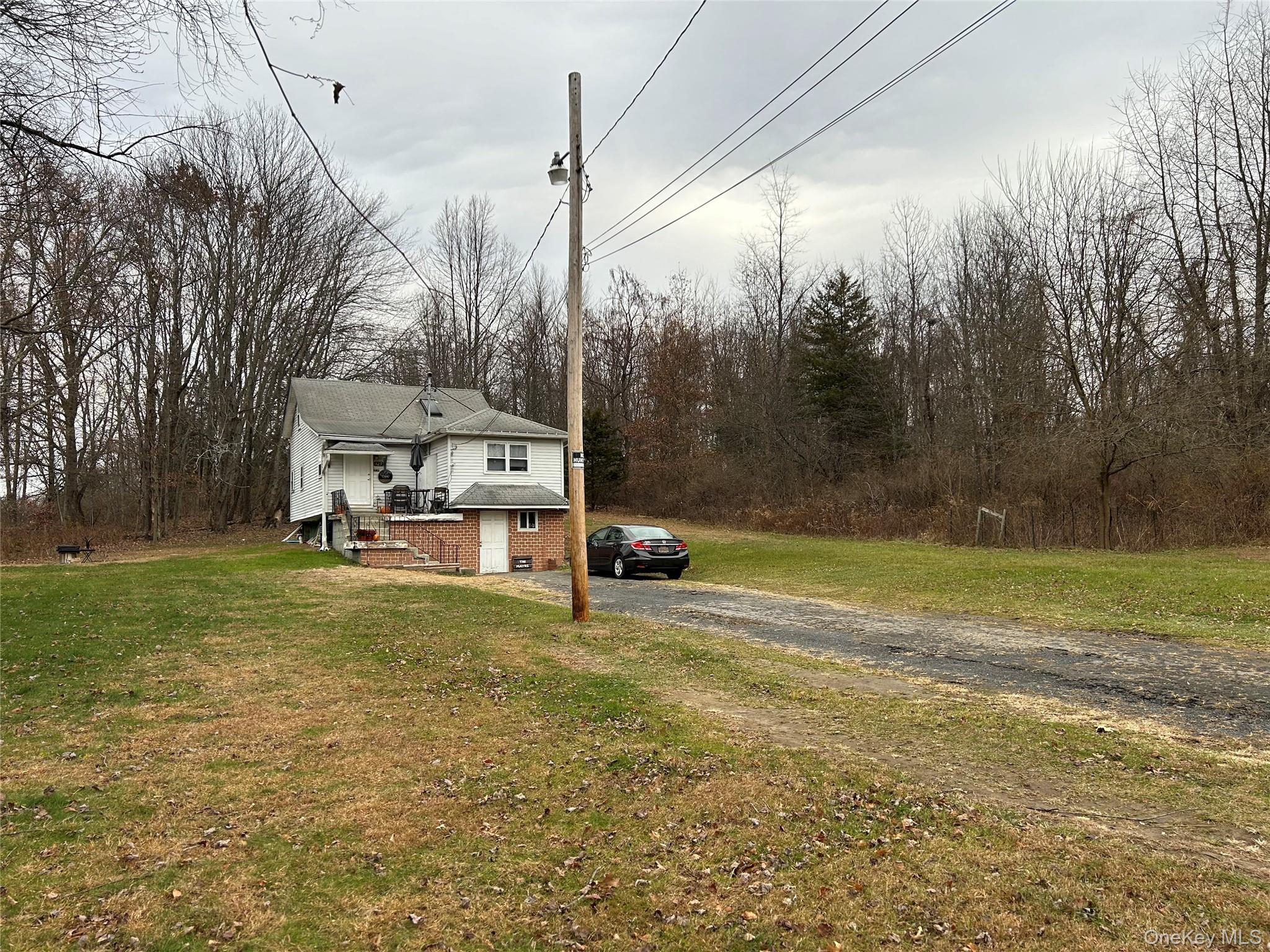 129 Station Road New Paltz, NY 12561 - Photo 3 of 5 a view of a house with a yard