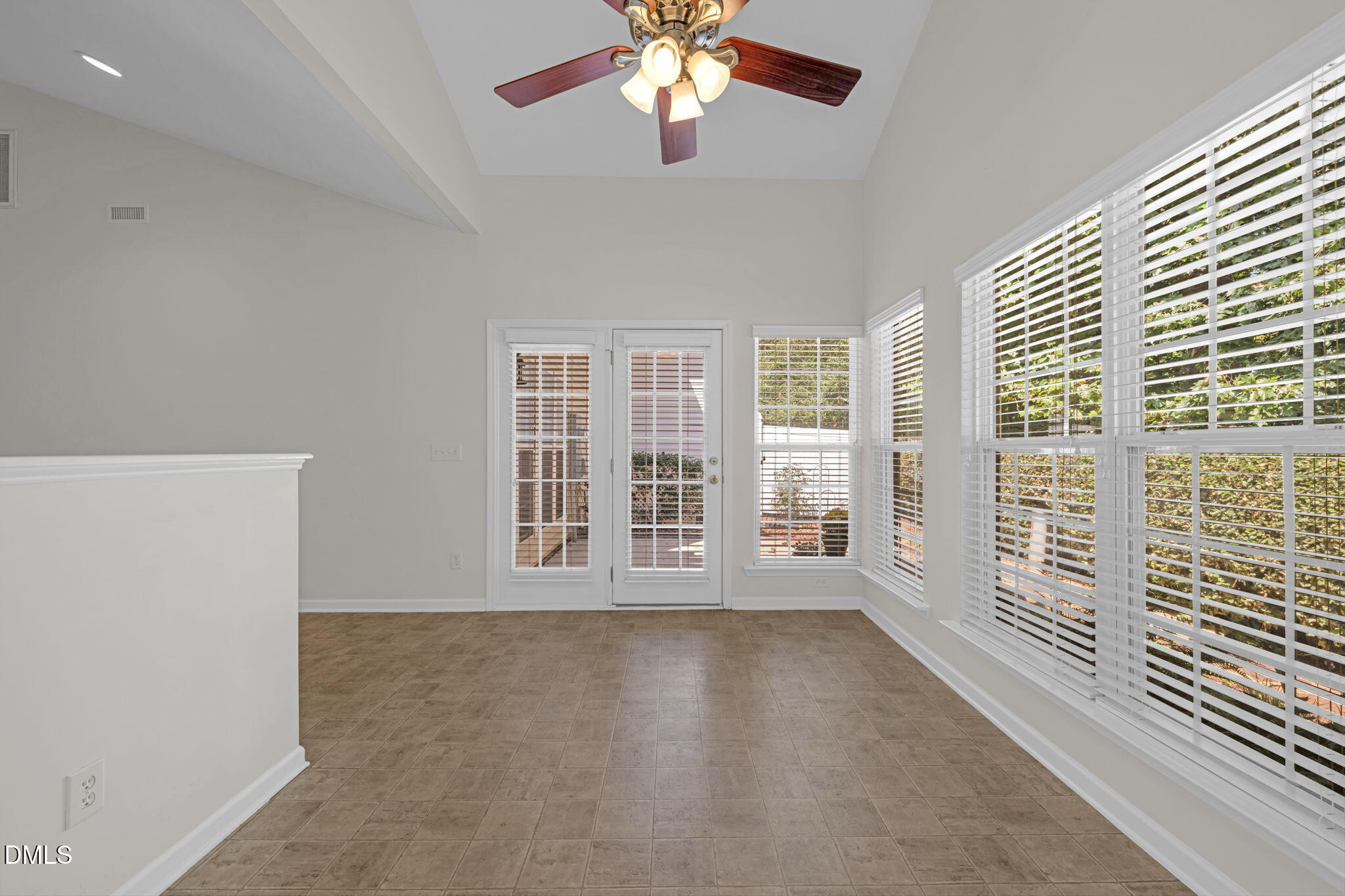 12014 Fox Valley Street Raleigh, NC 27614 - Photo 13 of 42 a view of an empty room with a window